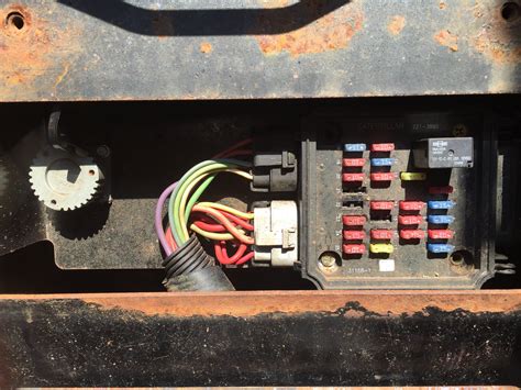 cat fuse box location